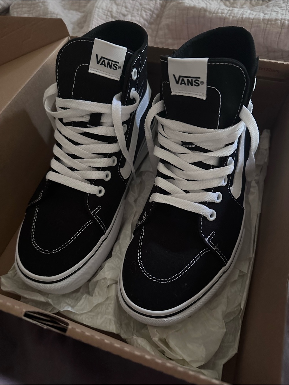 Vans Black and White High-Top Skate Sneakers